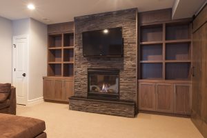 walnut fireplace cabinetry surround book shelves clarendon Hills illinois wheatland cabinets