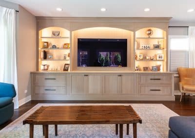 Built In Entertainment Center in River Forest, Illinois rift white oak arched tops shaker doors large media center