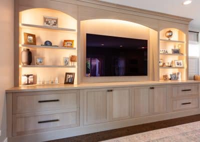 Built In Entertainment Center in River Forest, Illinois rift white oak arched tops shaker doors large media center