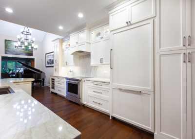 Custom White Custom Cabinets in Naperville, Illinois taj mahal quartzite, frameless full overlay, double stacked uppers