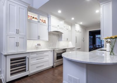 Custom White Custom Cabinets in Naperville, Illinois taj mahal quartzite, frameless full overlay, double stacked uppers