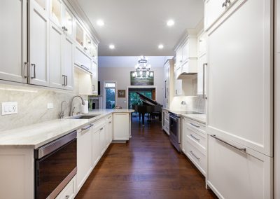 Custom White Custom Cabinets in Naperville, Illinois taj mahal quartzite, frameless full overlay, double stacked uppers