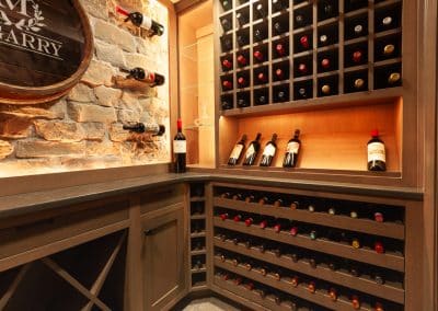 Home Wine Cellar in Naperville, Illinois glass doors inset cabinetry brown stain wine storage