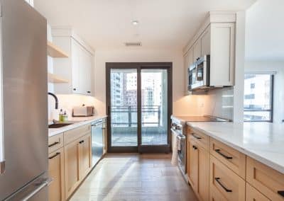 modern kitchen renovation condo chicago illinois rift white oak calacatta quartz backsplash