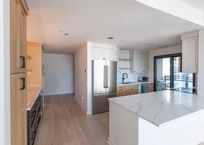 modern kitchen renovation condo chicago illinois rift white oak calacatta quartz backsplash